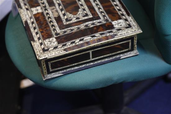 An 18th century Indo-Portuguese ivory, ebony and tortoiseshell games box, width 15.25in.